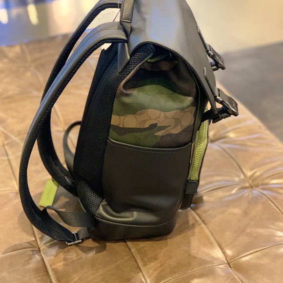 coach backpack mens camo Gotham Pack Stay organized with multiple storage options featuring outside zip pockets and inside multifunction pockets Coach West Backpack In Signature